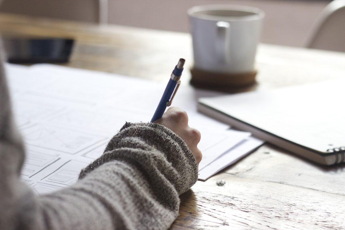 Person looking tired at desk